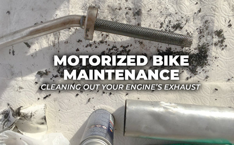 Motorized bike exhaust with mounting hardware.
