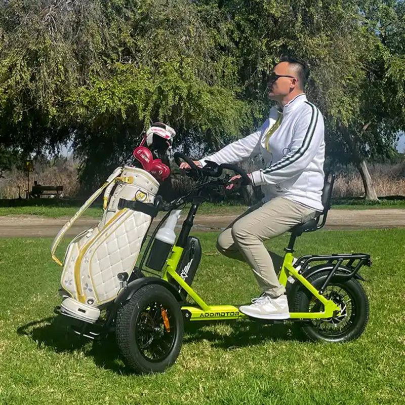 Electric Bike Addmotor SpytanX adult riding with a golf bag