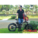 AddMotor 500W Motan M-150 Folding Fat Tire man holding bicycle next to river