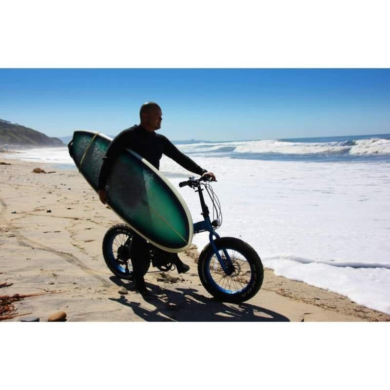 E-Mojo 500W Lynx PRO Fat Tire Folding man riding bike with surfboard
