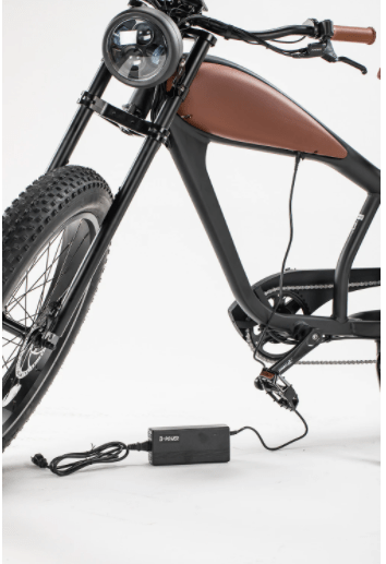 Civi 750W Cheetah Cafe Racer Fat Tire bicycle with charger plugged in